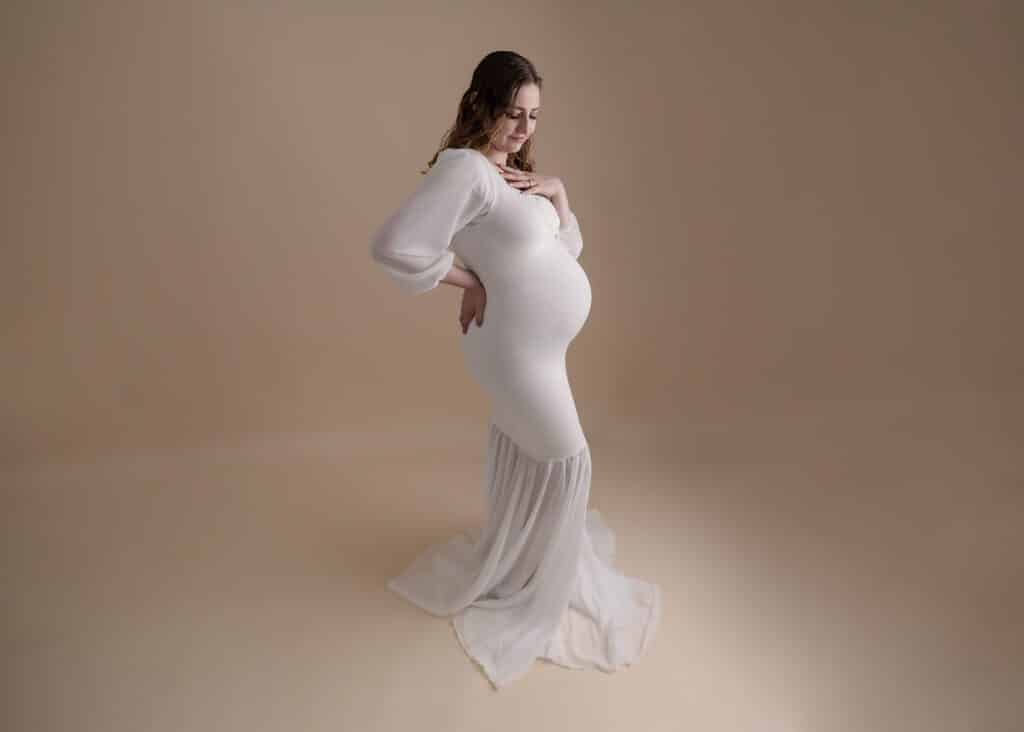 pregnant mom in white dress utah maternity portraits