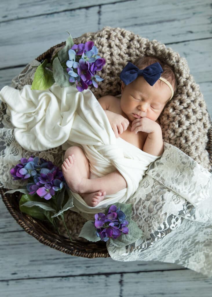 baby girl in basket newborn photography Utah County