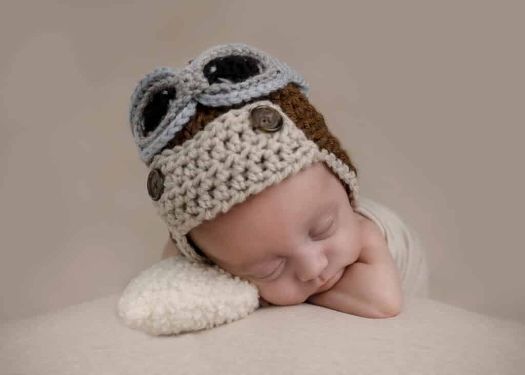 baby with pilot hat