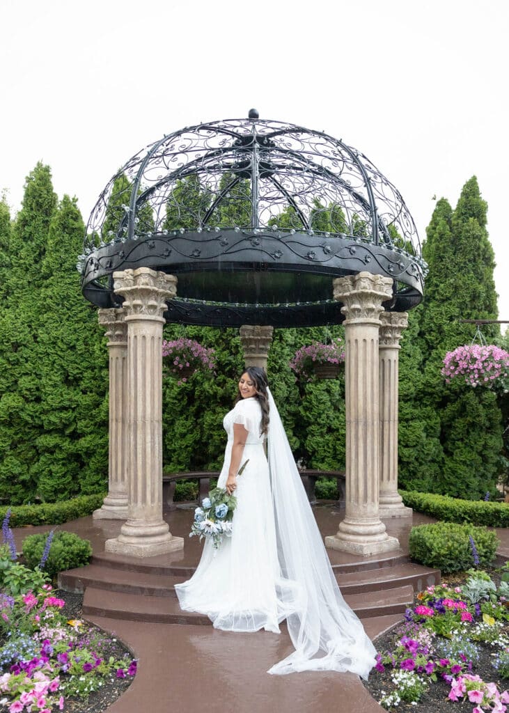 bride in front of columns