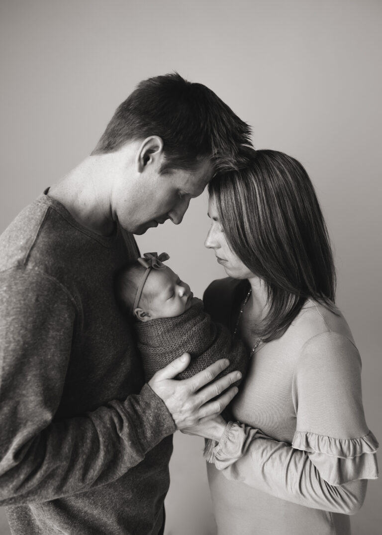 newborn baby girl in portrait with mom and dad utah county newborn photographer provo