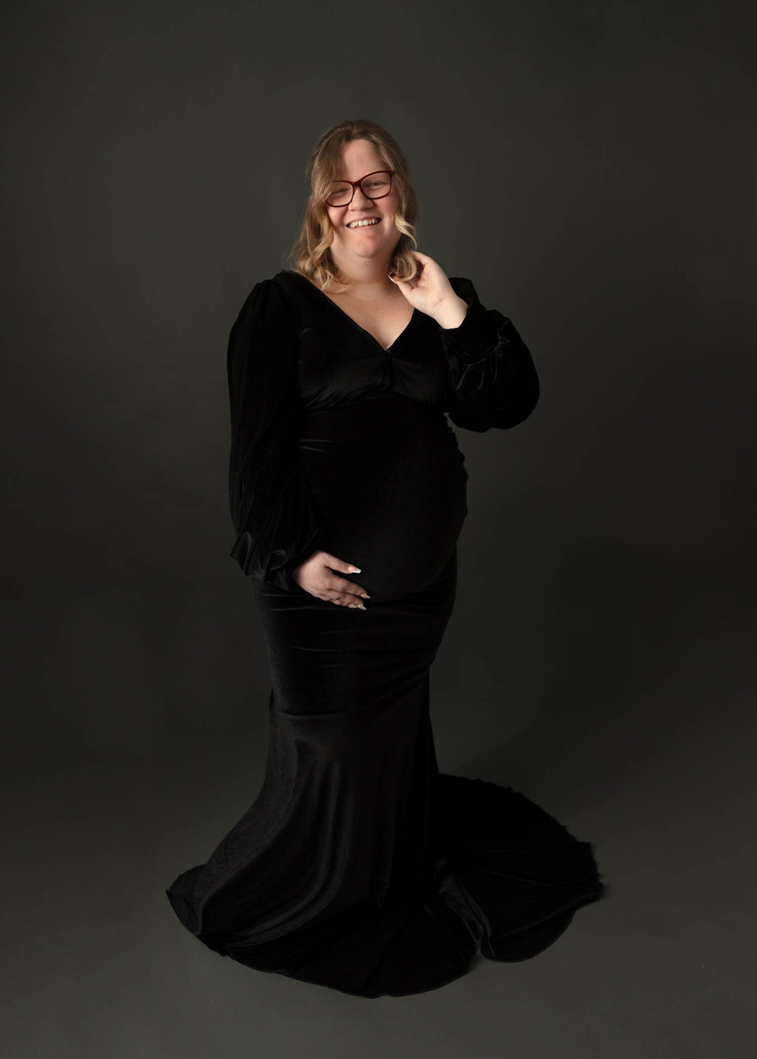 pregnant mom maternity portrait in black velvet maternity gown